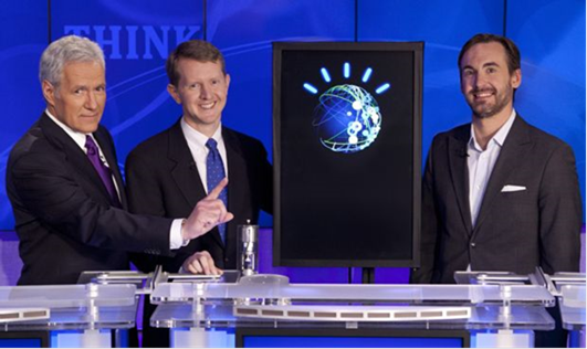 Cognitive systems - Jeopardy! host Alex Trebek with contestants Ken Jennings, Watson, and Brad Rutter